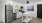 a kitchen with white cabinets